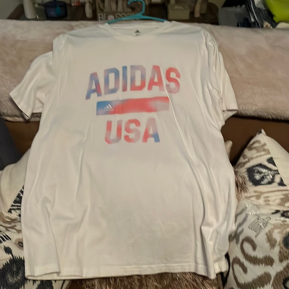 Adidas shirt new never been worn.